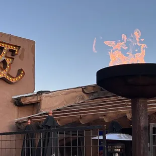 a fire in the middle of a fire pit