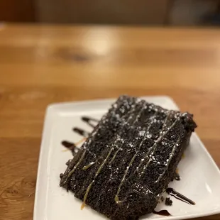a piece of chocolate cake on a plate