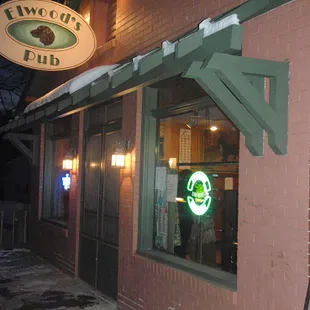 a neon sign in the window
