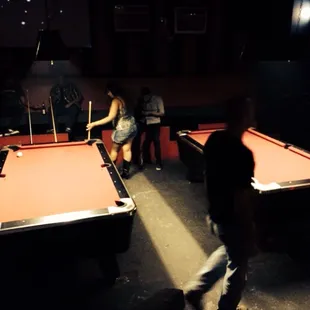 Pool tables in a club .. Kind of cool hehe