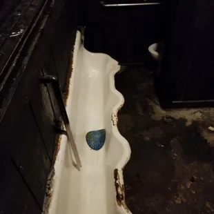 The trough! We had one of these in my elementary school boys bathroom.