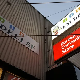 a sign for a convenience store