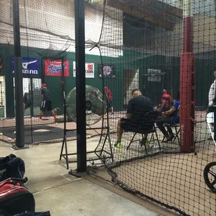 Several indoor batting cages