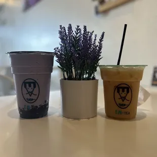(left) Taste of Love Smoothie: Raspberry, Yogurt, and Taro PREMIUM with taro boba  (right) Lychee Large Iced Regular Tea