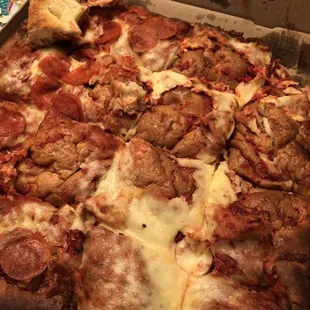 Peeled the cheese back to brown dough. The pizza looked disgusting we couldn't even attempt to taste it.