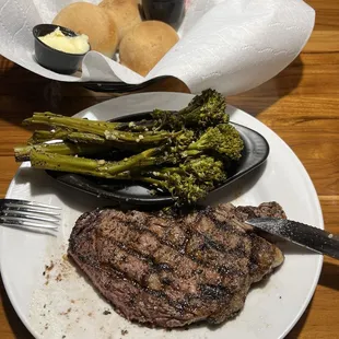 Ribeye steak with sautéed broccolini