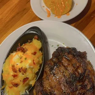 Ribeye and loaded mashed potatoes fried green tomatoes
