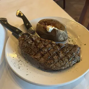 N. Y. Strip 14oz. Medium rare- maybe the best I have had. Move over Peter Luger