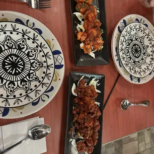 Two of the appetizers- I forget what they are. The lighter one was a tomato/garlic sauce with shrimp and it was my favorite.
