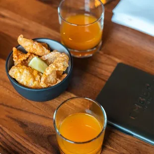 Pork rinds, spicy margarita = a great start to dinner and they&apos;re FREE!
