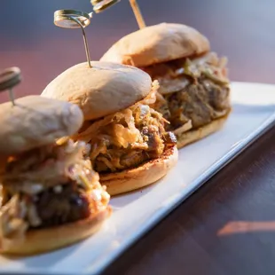 Pulled Pork Sliders southern slaw, mustard bbq, tobacco onions, brioche bun