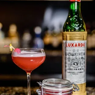 Pink Lady Bacardi Light Rum, Luxardo Maraschino Liqueur, pineapple juice, pomegranate juice
