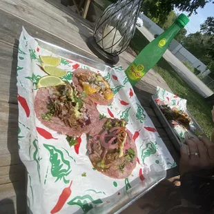 The al pastor (Top), Finer Things w/ rib meat and Brie cheese (Middle), The Bark w/ brisket, pickled onions, and guacamole (Bottom)