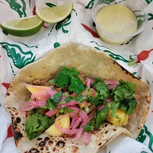 The Bad Hombre: pulled Al pastor pork, fresh pineapple, pickled onions, cilantro.