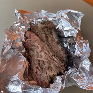 a piece of meat wrapped in foil