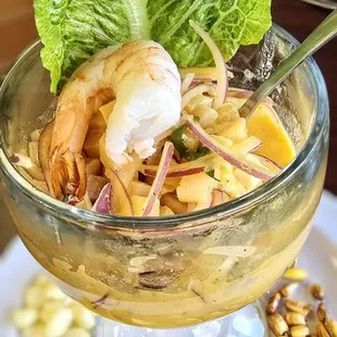 Fish cevichee with shrimp, roasted corn kernels, fresh corn kernels and plantain chips