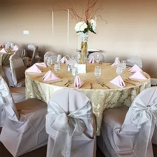 Beautiful linens and tall centerpieces