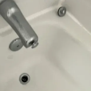 Can&apos;t tell in pic but that faucet has a big gap between tub and faucet. Also the tub floor sinks down when you step on it.