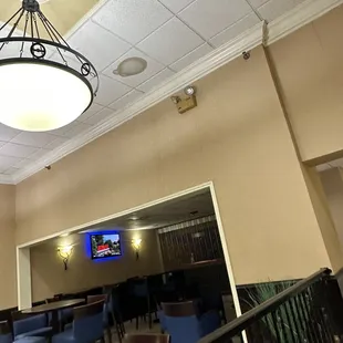 Stain on ceiling of front lobby area.