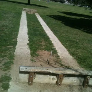 Horseshoe court with poles on either end