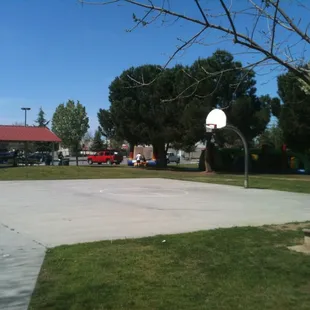 Basketball half court with 1 basket complete with net