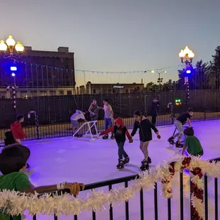 Ice skating is not just for winter! Rent our Synthetic Ice Skating Rink all year long for a family-friendly fun time! www.EmeraldEvents.com