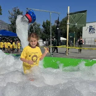 Girl in foam bubbles