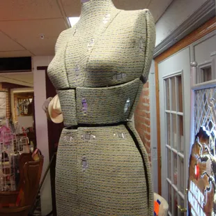 A vintage dress form.
