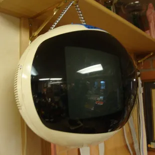 A vintage JVC Videosphere hanging TV from the 70s.