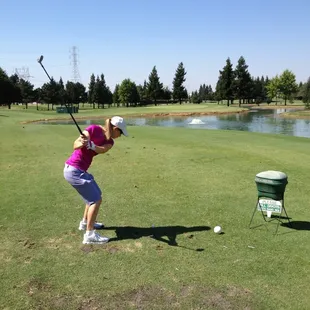 Taking aim at the Par 3 5th hole.  The green slopes down to the water on all sides; better not miss!