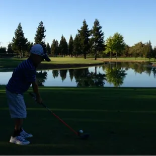 Par 3 fifth hole over water.