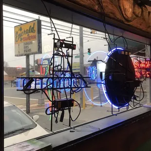 a neon sign in a window