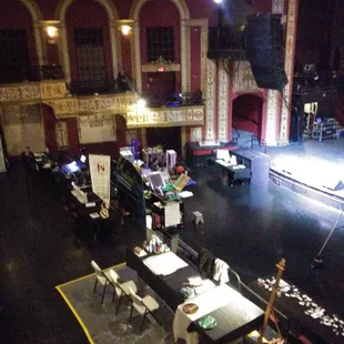 a stage with tables and chairs