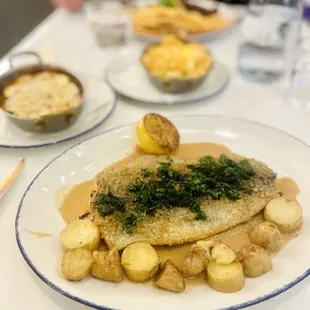 The fish dish with potatoes (don't remember exact name lol)