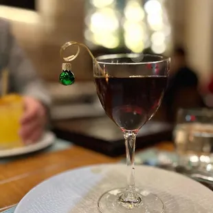  glass of wine on a plate