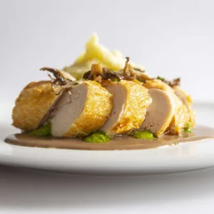 a plate of food on a white table