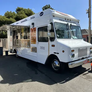 a food truck parked in a parking lot