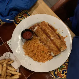 burritos with beans and meat. Side of rice and fries.