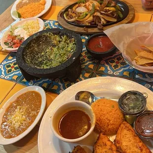 Holy guacamole, Birria tacos, steak fajitas.