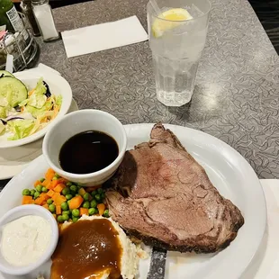 a plate of meat and vegetables
