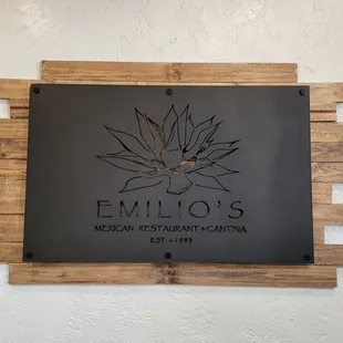 The bronzed sign that launched a restaurant enjoying its 40th yr of operation...