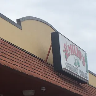 Emilio&apos;s Grocery sign