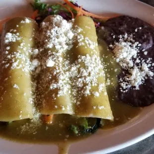 Veggie enchiladas with rice and beans