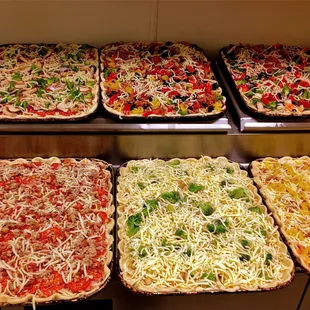 Pizza main ingredients. dough sauce and cheeeeeeese!!!! We always do it right at Emilio's