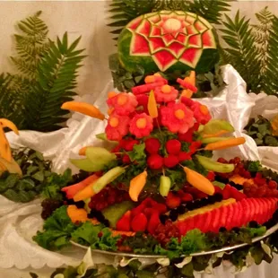 Edible arrangements got nothing on us. this kinda stuff is available with special order.