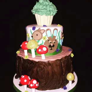 1st birthday cake. Giant cupcake on top serves as &quot;smash&quot; cake.