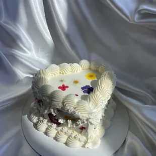 a heart shaped cake on a plate