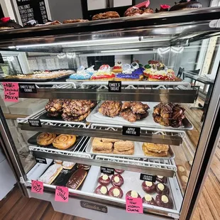 a display case full of pastries