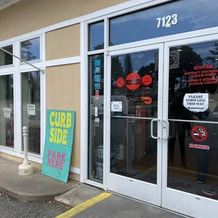 Outside entrance. Curbside pickup for donuts.