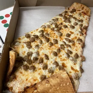 Slice of sausage pizza